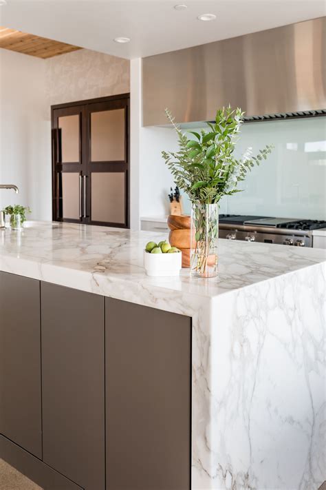 Marble Island Waterfall Countertop Contemporary Kitchen Cabinetry