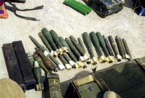 A Weapons Cache Of Rocket Propelled Grenades Rpg Mortar Rounds And
