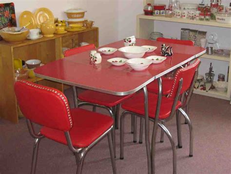 A small kitchen table and chairs in a bright metallic shade can really liven up a room. Retro Kitchen Table and Chairs Set - Decor Ideas