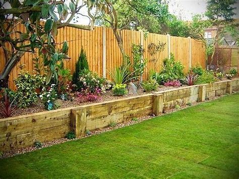 Raised Flower Bed Along Fence Garden Along Fence Flowers Pinterest