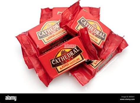 Pile Of Individually Wrapped Portions Of Cathedral City Mini Mature Mellow Cheddar Cheese