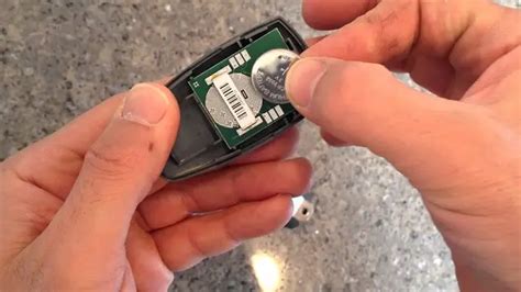 How to change battery in garage door opener remote control