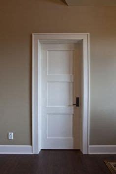 Here is another idea showing a matching presence between a wood front door and white trim with staircase design. Image result for wood doors and white trim | Двери