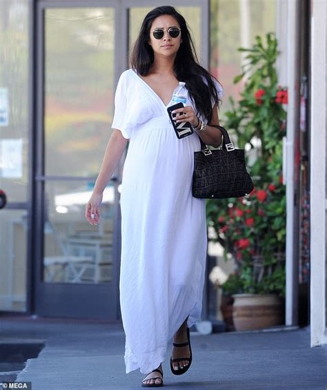 shay mitchell is an angelic mom to be as she dresses up her bump in flowing white maxi dress