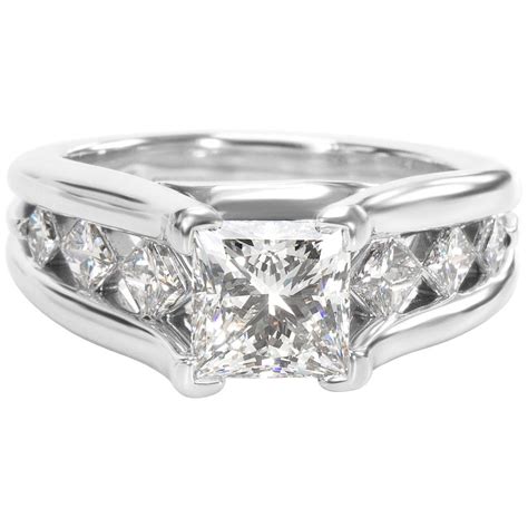 Chandelier style engagement ring this stunner features traditionally cut baguette diamonds in a unique claw set cluster. AGS Certified Princess Diamond Engagement Ring in Platinum G Vs2, 2.37 Carat For Sale at 1stdibs