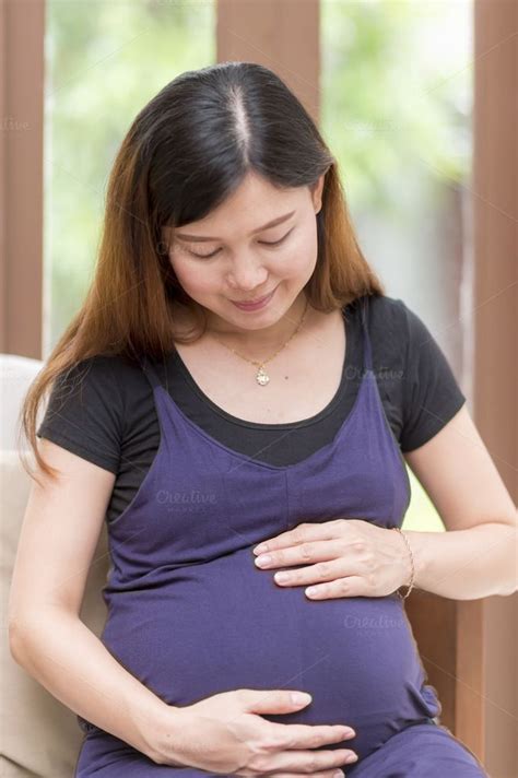 Asian Pregnant With Belly Containing Abdomen Anticipation And Asian