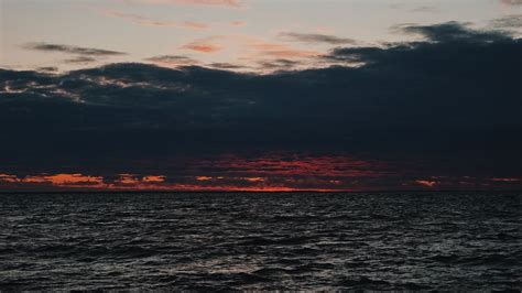 Download Wallpaper 1600x900 Sea Horizon Sunset Clouds Widescreen 16