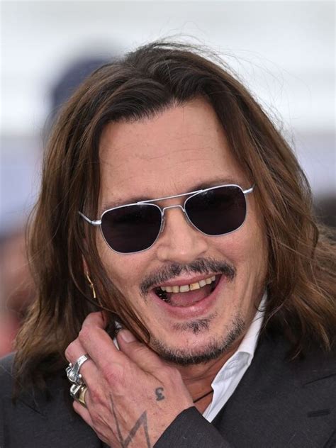 Johnny Depp Compared To Jack Sparrow Over ‘rotting Teeth As He Grins