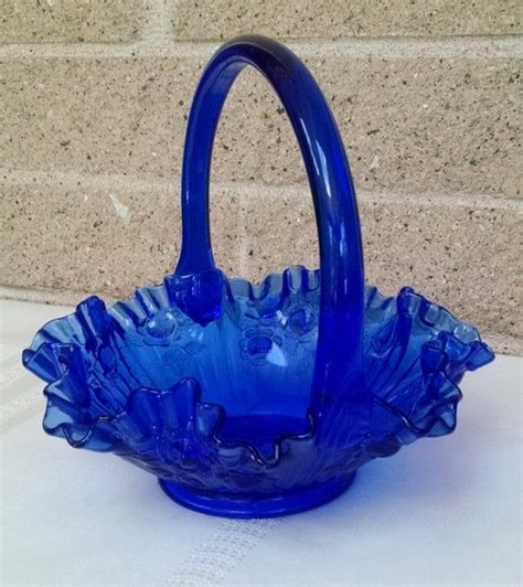 This Fenton Art Glass Basket Is A Beautiful Blue Color It Has A Cabbage Rose Pattern And A