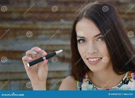 Young Woman Smoking Electronic Cigarette E Cigarette Stock Photo