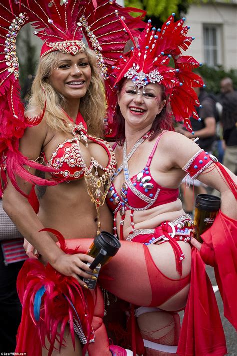 Notting Hill Carnival Revellers Refuse To Let The Rain Put A Dampener