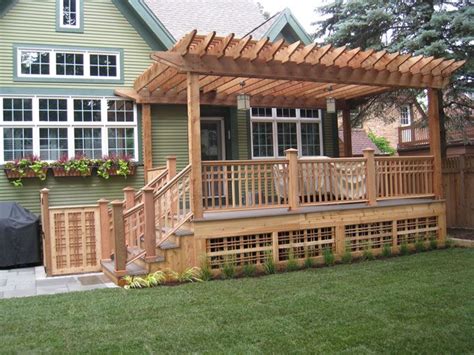 The lower deck is a great place to hang out in the sun, while the cascading stairs flow into the yard and provide lots of space for planters and pots. Pin by Heather G on My Style | Deck with pergola, Pergola ...