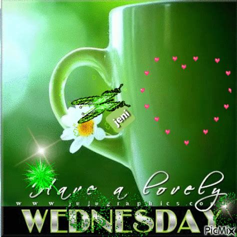 A Green Coffee Cup With White Flowers On It And The Words Wednesday