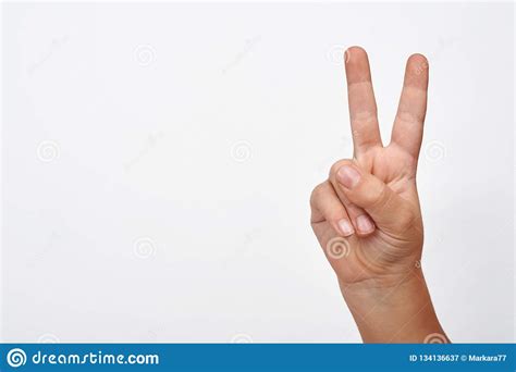 Child Hand Shows Two Finger Displaying Peace And Win Sign Stock Image