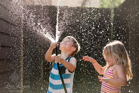 Kids Playing With A Water Hose By Lisa Rappa Click Community Blog
