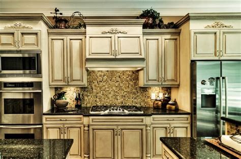 How to glaze cabinets tutorial in this post. Kitchen cabinets with antiquing glaze in classic kitchen ...