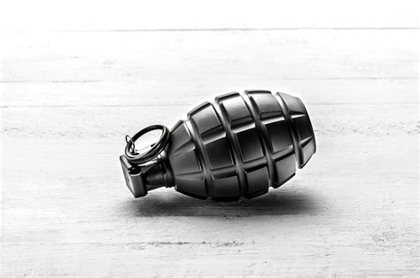 Premium Photo Hand Grenade With The Pin In