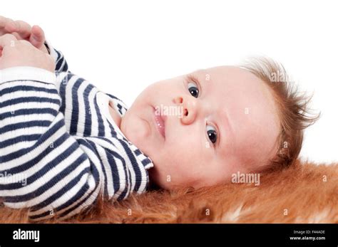 Adorable Baby Lying On Fur Stock Photo Alamy