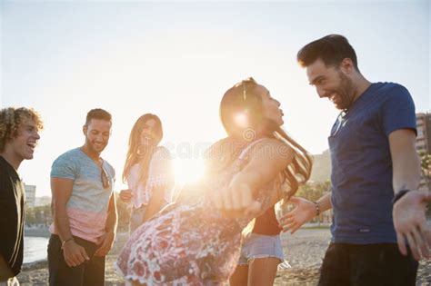 Couple Dancing On Beach Partying With Friends Stock Image Image Of Couple Happy 102757289