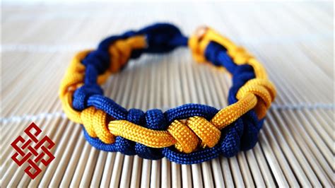The eternity knot is popular for being one of the most decorative knots. How to Make the Inception Snake Knot Paracord Bracelet Tutorial - YouTube