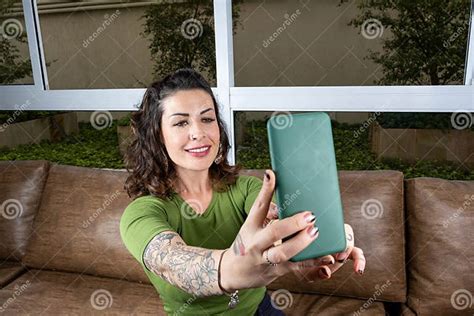 Brazilian Tattooed Doing Selfie In The Background A Large Window Stock