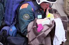 russia found alive baby rubble rescue under after boy hours girl
