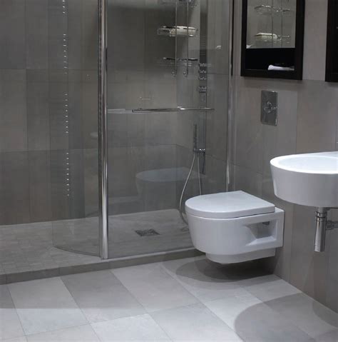 This wet room is based on an all white design featuring white walls, white tub, white basin and white pot. Wet room sleek love it | Small bathroom, Washroom decor ...