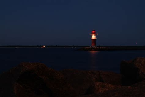Free Images Sea Coast Water Ocean Horizon Lighthouse Sunset