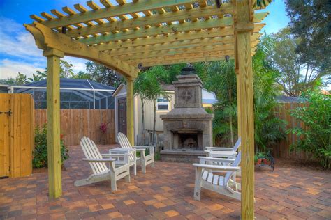 Fireplace With Pergola Tropical Patio Tampa By Landscape Fusion