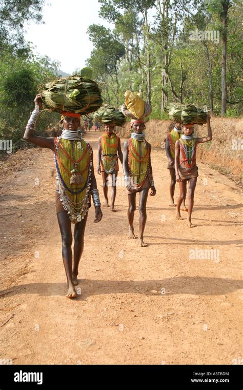 group of bonda tribal women on their way to the weekly market in koraput orissa india stock