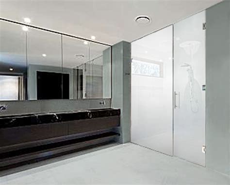 Wide rainfall shower head and a hand held shower head with adjustable settings for many different water spray patterns. Floor to Ceiling Shower Enclosures | Full Height Steam Room Enclosure