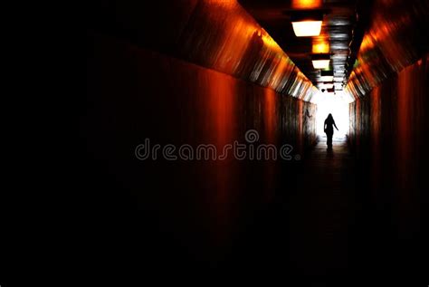 Tunnel Man Walking In Motion Ending Depression Towards The Light Stock