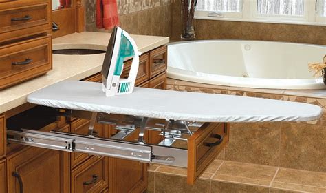 If you have free space under laundry room cabinets, you can store your ironing board. Vanity Fold Out Ironing Board, VIB-20CR (Rev A Shelf)