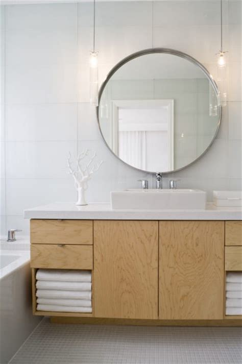 The mirror should be centered above the basin and measure a couple inches less than the vanity or sink area. Renovating your bathroom: Simple touches add up | The Star