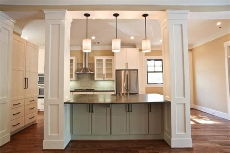 Even if there isn't much space in this kitchen, it managed to add two islands with beautiful sophisticated design. Pin by holly fish on kitchen | Kitchen columns, Kitchen ...