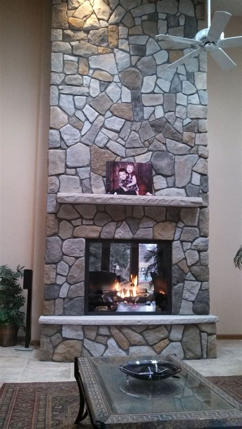 gray fieldstone fireplace