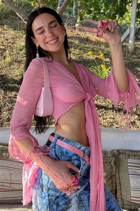 Dua Lipa Braless Showing Off Her Nipples In A See Through Pink Top