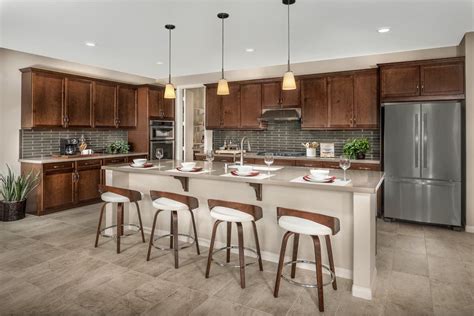 Floor model abrasive blasting cabinet: We love the contrast of the dark wood cabinets with light grey counters and isla… | Grey kitchen ...