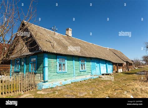 Old Wooden Blue House In Village Farmhouse In Belarus View Of Rustic