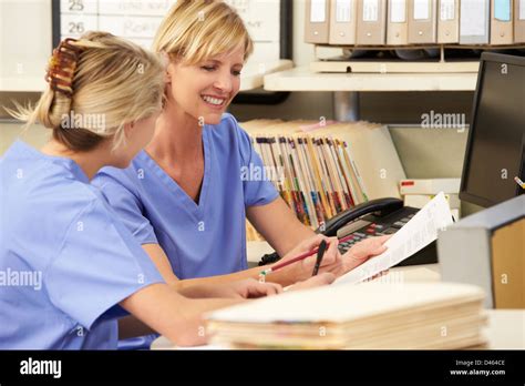 Two Nurses Talking Hi Res Stock Photography And Images Alamy