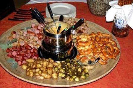 When the meat is cooked, dip it into the sauces, and pile it onto the bread. German Fondue Platter | Chatty Gourmet