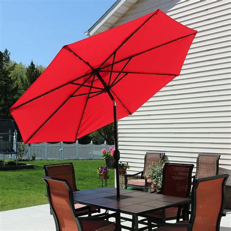 sunnydaze solar outdoor patio umbrella with led lights tilt and crank aluminum 9 foot red