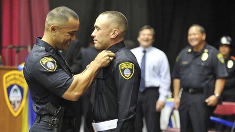 Father And Son Guam Police Department Lt Mark Torre Left Pins A