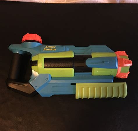 Super Soaker Aqua Shock Aquashock Water Blaster Gun Sneak Attack 4 Way Spray Squirt Toys