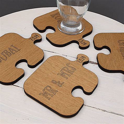 Four Personalised Wooden Jigsaw Coasters By Neltempo
