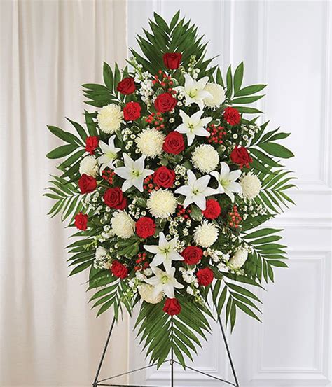 This mourning bouquet consists of roses that are tied so that they can be placed in a the actual size of the bouquet depends on the final choice of the size of the bouquet by the customer and is determined by the number of flowers in the. Red & White Sympathy Standing Spray at From You Flowers