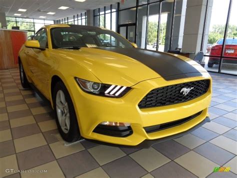 Sold sold sold clean carproof, no accidents, former daily rental with low kilometers and racing stripes. 2016 Triple Yellow Tricoat Ford Mustang V6 Coupe ...