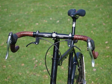 | a bell hung from a cow's neck to clank when she moves and thus indicate where she is. Salsa Cowbell 3 Handlebar | Freshly installed Salsa ...