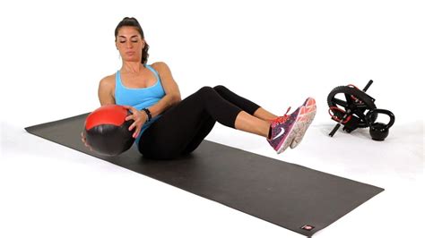 How To Do Medicine Ball Side Twists Or Rotations Howcast