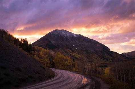 Dirt Mountain Road At Sunset Crested Photograph By Brandon